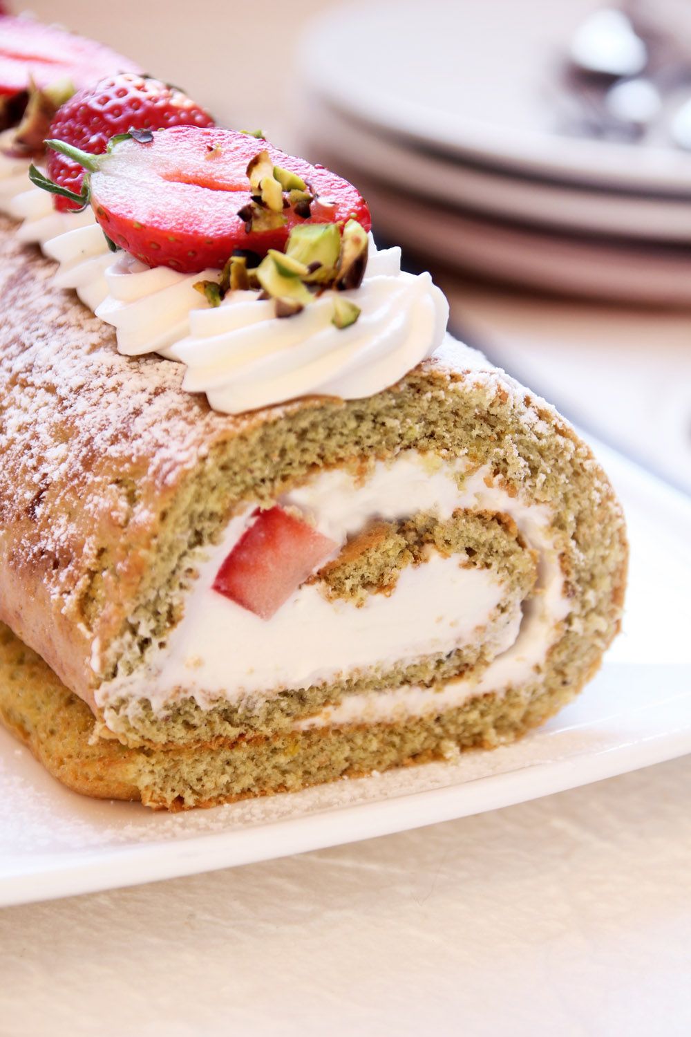 Pistachio Cake Roll with Ricotta Cream and Strawberries