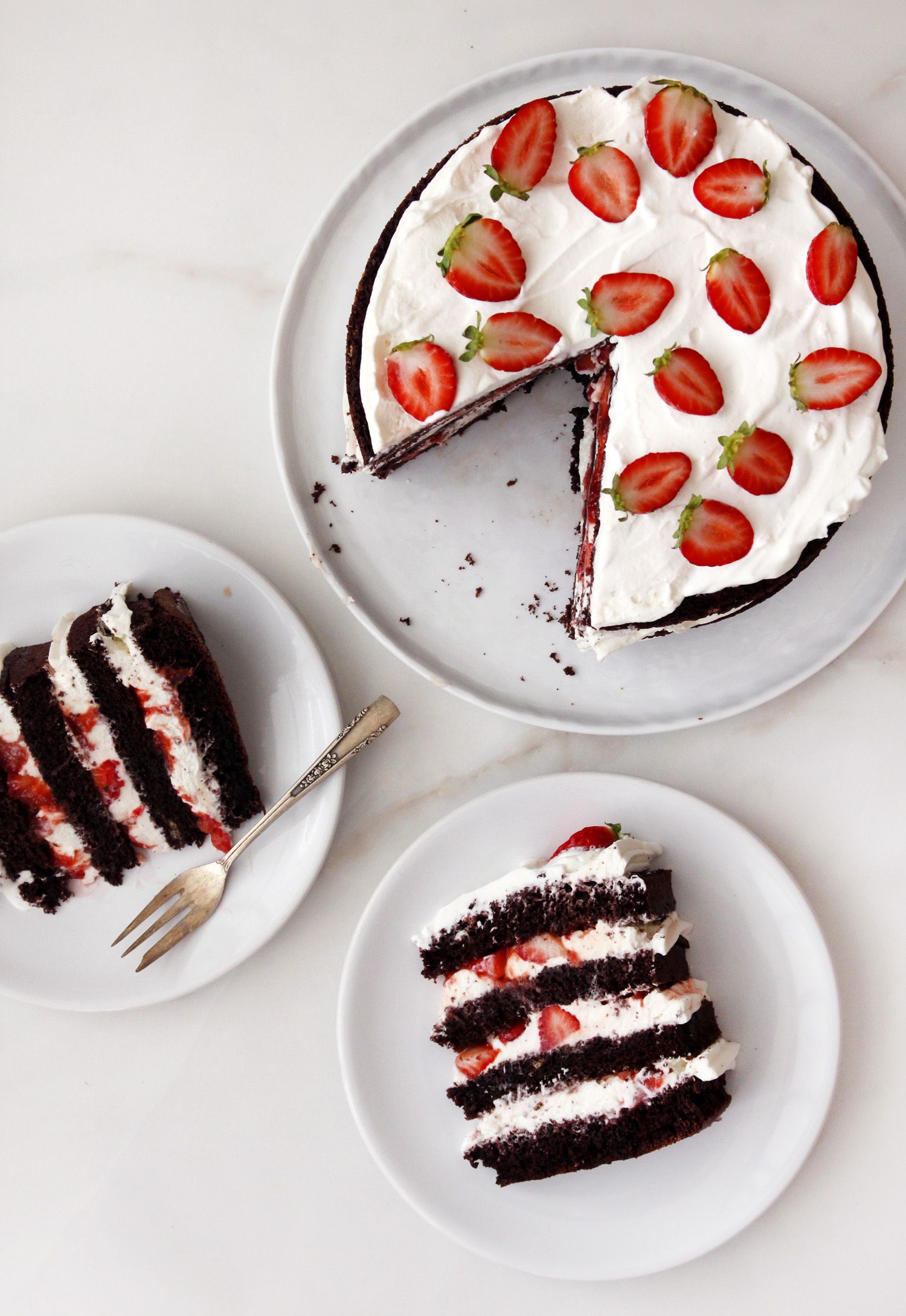 Sky-high Chocolate, Cream and Strawberry Layer Cake