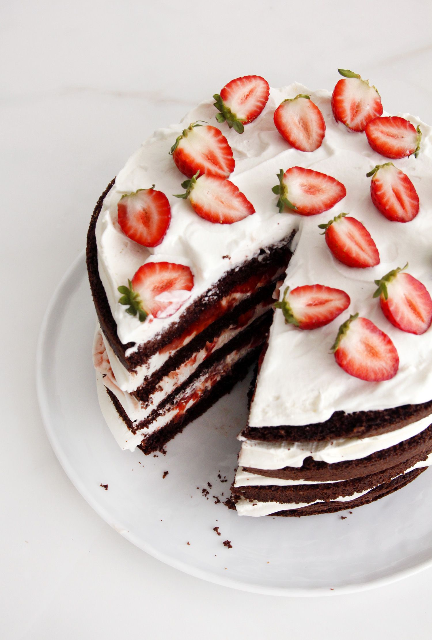 Sky-high Chocolate, Cream and Strawberry Layer Cake