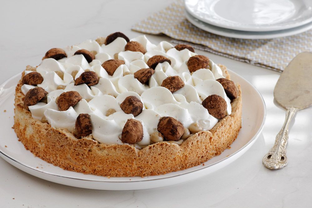 Almond Meringue Cake with Coffee and Whipped Cream