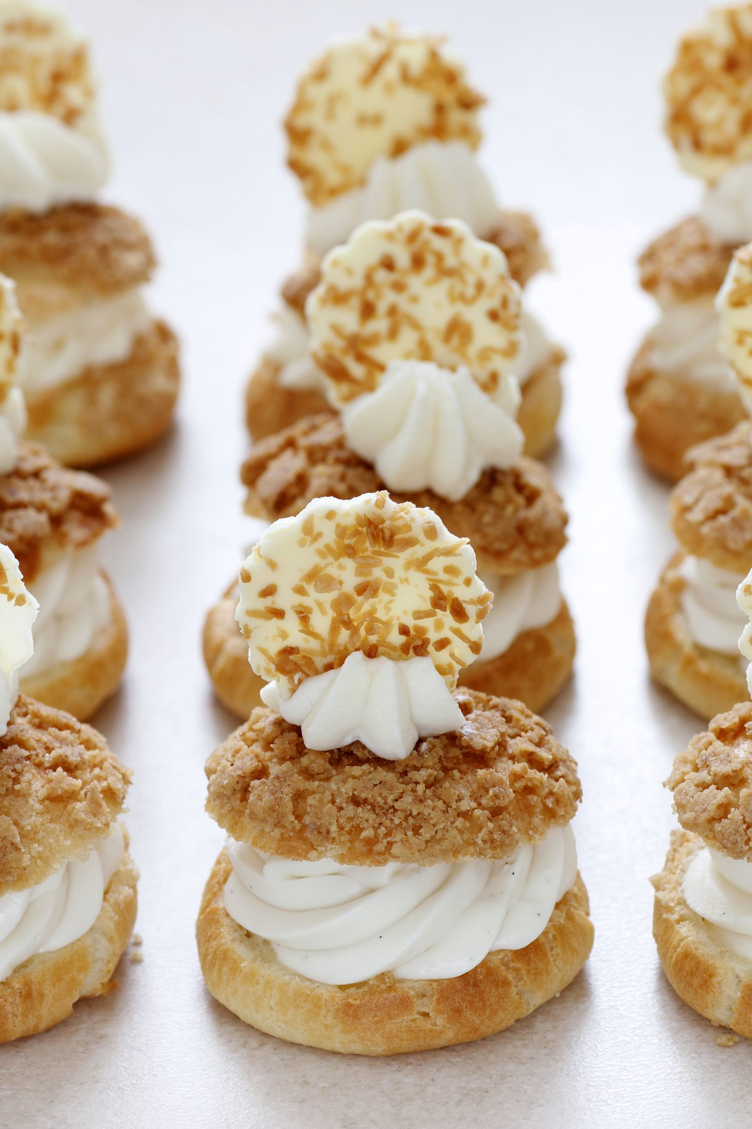 Cream Puffs filled with Honey White Chocolate Mousse and Almond Streusel